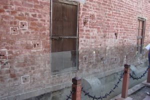The bullet marks are still visible. Will we ever forget?
