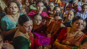 Women sing prayers for Lord Ram on the occasion of Ram Navami at Wadala in Mumbai, India, on Tuesday, April 4, 2017
