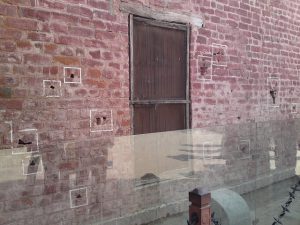 Bullet holes in Memorial Wall