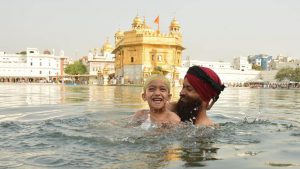 Devotees taking holy dip and paying obeisance at Golden Temple on the occasion of martyrdom anniversary of Sikh Guru Arjan Dev in Amritsar