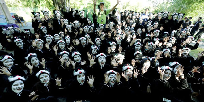 Largest gathering of people dressed as cats