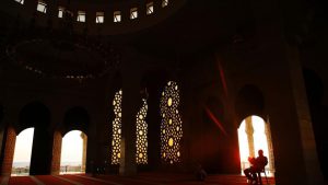 A Palestinian man reads from the Quran, during the holy Muslim fasting month of Ramadan at a mosque in Gaza City. Ramadan is underway with Muslims across the world engaged in fasting, prayer and efforts towards spiritual cleansing.The fast is one of the five main obligations under the religion. While the core tenets of abstinence and restraint from vices are common throughout, local customs and factors also play a part in shaping the Ramadan experience across regions.
