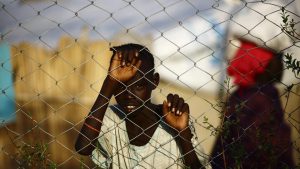 A South Sudanese refugee child stands at the UNHCR camp of al-Algaya in Sudan's White Nile state, south of Khartoum, on May 17, 2017. More than 95,000 South Sudanese have entered Sudan so far this year, the UN said, as thousands continue to flee war and famine in the world's youngest nation. South Sudan, which split from the north in 2011, has declared famine in parts of the country, saying a million people are on the brink of starvation.