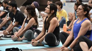 A group session on Yoga Day at Cyberhub in Gurgaon, Haryana