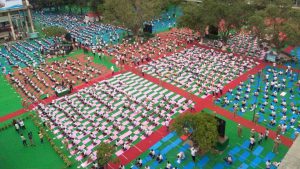 A large crowd takes part in yoga exercises in Chandigarh