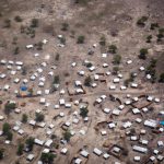 Aerial view of the new settlement of displaced families in Aburoc, South Sudan on June 5, 2017. Government offensives on the West Bank of the Nile river in April and May 2017 led to the capture of several villages, including Kodok. Up to 25,000 people were displaced during these clashes, most of whom initially fled toward Aburoc. In subsequent weeks, at least 20,000 people fled to Sudan. Many of those in Aburoc walked for days on foot to reach the location without access to sufficient water due to conflict along the River Nile and arrived exhausted and weak.