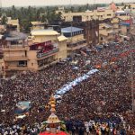 Devotees gather in the street at Bada Danda in Puri to witness the grand ceremonial procession during Rath Yatra festival. The festival commemorates Lord Jagannath’s annual visit to Gundicha Temple