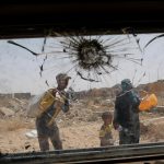 Displaced Iraqis flee during a fight between Iraqi Counter Terrorism Service (CTS) forces and Islamic State militants in western Mosul, Iraq, May 15, 2017.