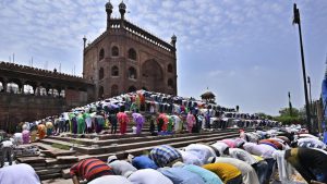 Men and women congregate in prayer on the last Friday of this year’s month of Ramzan