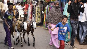 Men and women dress for the occasion and offer congregational prayers on the day of Eid in an open field or a mosque. The meat of the slaughtered animal is equally distributed into three halves among family members, relatives and as charity among the poor.