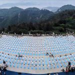 Participants practice yoga at the third International Day of Yoga celebrations at Dongtou Wanghai Pavilion in Wenzhou in China’s Zhejiang on June 19, 2017. Wenzhou (Dongtou) became the sixth city in the Eastern China region to host Yoga Day celebrations.