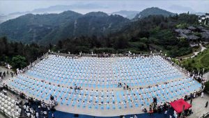 Participants practice yoga at the third International Day of Yoga celebrations at Dongtou Wanghai Pavilion in Wenzhou in China’s Zhejiang on June 19, 2017. Wenzhou (Dongtou) became the sixth city in the Eastern China region to host Yoga Day celebrations.