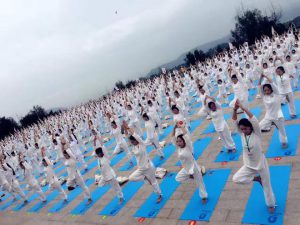 Participants practice yoga at the third International Day of Yoga celebrations at Dongtou Wanghai Pavilion in Wenzhou in China’s Zhejiang on June 19, 2017. Wenzhou (Dongtou) became the sixth city in the Eastern China region to host Yoga Day celebrations.