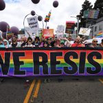 People march during the #ResistMarch at the 47th annual LA Pride Festival in Hollywood, California on June 11, 2017