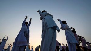 People perform yoga during a four-day long camp by Baba Ramdev ahead of International Yoga day in Ahmedabad, Gujarat on June 19, 2017.