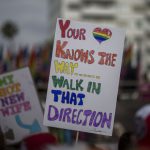 People walk in the #ResistMarch during the 47th annual LA Pride Festival on June 11, 2017, in the Hollywood section of Los Angeles and West Hollywood, California. Inspired by the huge women’s marches that took place around the world following the inauguration of President Donald Trump and by the early pride demonstrations of the 1970s, LA Pride replaced its decades-old parade with the #ResistMarch protest to promote human rights by marching from Hollywood to West Hollywood.