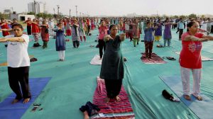 School teachers take part in a yoga practice camp in Ahmedabad, Gujarat on June 08, 2017.