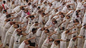 Students perform yoga on the occasion of International Yoga Day at Mira Road in Mumbai, Maharashtra