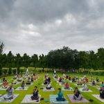 Yoga enthusiasts take part in a Yoga training session at Nehru park, a day before the International Day of Yoga in New Delhi on June 20, 2017.