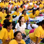 Yoga enthusiasts take part in a mass yoga session on International Yoga Day at the Shree Kanteerava Stadium in Bangalore on June 21.