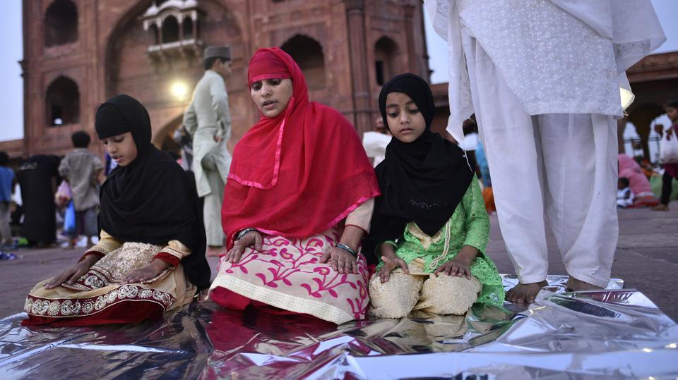 Young girls with family at the Jama Masjid complex having completed their first fast, on the eve of Juma-tul-Wida, on June 22, 2017 in Delhi