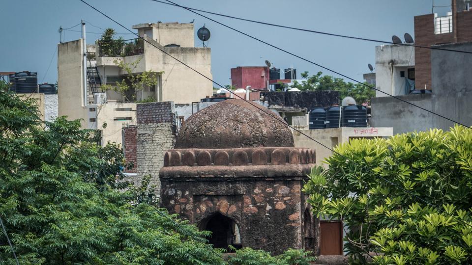 A remnant of the medieval Jahanpanah city, the Khirki Masjid, dwarfed by matchbox like buildings now jostles for space and attention from locals and visitors alike to the vibrant locality that surrounds this monument.