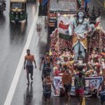 Millions of ‘Kanwarias’ from different states ,carry Kanwars on their shoulders, wearing orange dresses and walking hundreds of miles barefooted to bathe the ‘Shivaling’.