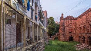 The current state of the Khirki Masjid, crept upon by dense foliage is one of obscurity. A fence has been put up to keep peole from adjacent buildings from throwing garbage into the compound. Once frequented by children from the neighbourhood, the monument now sits vacant apart from the ASI guard posted at the site.