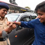 Wings Foundation & Navi Mumbai Police organised Raksha Bandhan Day for Awareness of road safety during which Police official tie Rakhi on the hands of people who break the traffic rules at Vashi in Navi Mumbai.