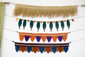 Students of New English School display idols made by them for sale at the campus in Pune.