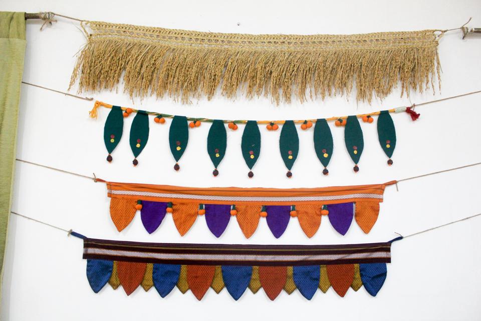 Students of New English School display idols made by them for sale at the campus in Pune.