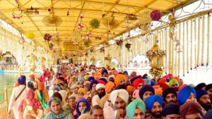 Devotees paying obeisance at Golden Temple on Gurpurab of Guru Ram Das, the founder of Amritsar