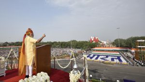 Indian Prime Minister Narendra Modi addresses while children choreograph the Hindi word ‘Bharat’ in the background. On the need for standing united, the Prime Minister said that India is about Shanti, Ekta and Sadbhavana and that casteism and communalism will not help us. Violence in the name of faith will not be tolerated in this land of Gandhi and Buddha.