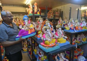 Surendra Bhat showcases the ecofriendly Ganesh Idols at his shop in Narayan Peth in Pune.