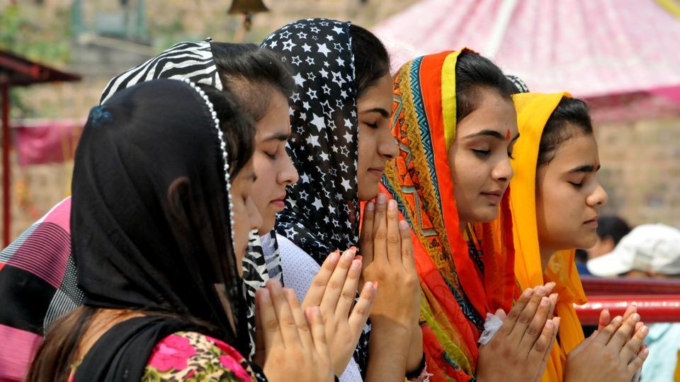 Devotees offers prayers inside the historical Kali Temple on the first day of Navratri in Jammu