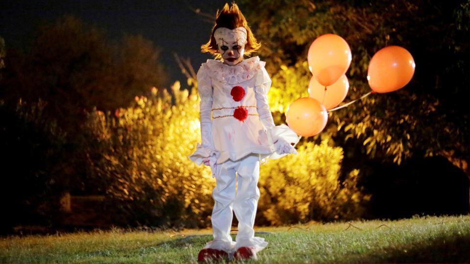 A boy dressed as Pennywise, the dancing clown from the movie ‘It’ poses for a photo during a Halloween party in Ciudad Juarez, Mexico.