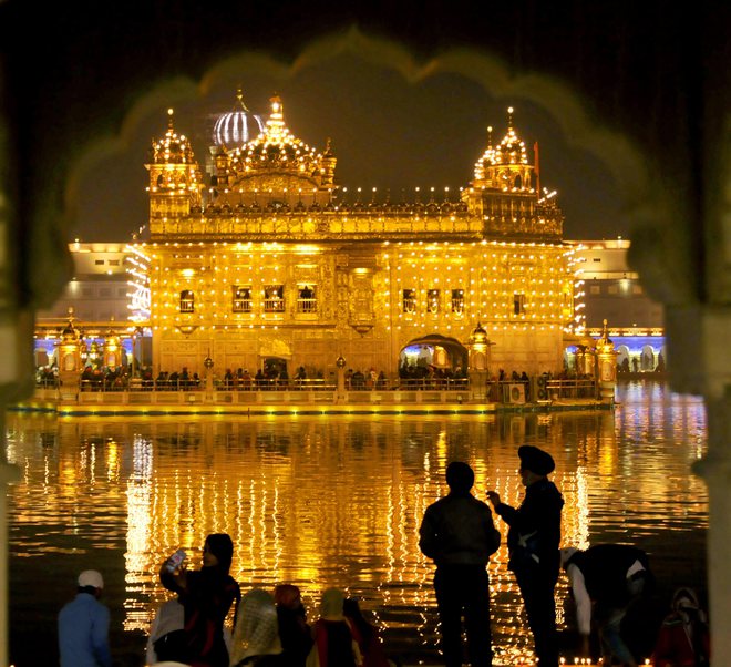 Illuminated Golden Temple seen on the occasion of the 351st birth anniversary of the tenth Guru of Sikhs, Sri Guru Gobind Singhji, in Amritsar on December 25, 2017