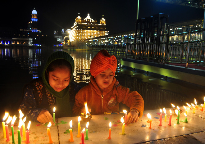Illuminated Golden Temple seen on the occasion of the 351st birth anniversary of the tenth Guru of Sikhs, Sri Guru Gobind Singhji, in Amritsar on December 25, 2017
