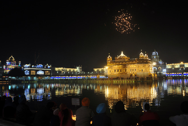 Illuminated Golden Temple seen on the occasion of the 351st birth anniversary of the tenth Guru of Sikhs, Sri Guru Gobind Singhji, in Amritsar on December 25, 2017