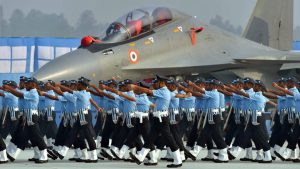 Indian Air Force personnel next to the Sukhoi-30 MKI fighter plane during the 85th Air Force Day celebrations.