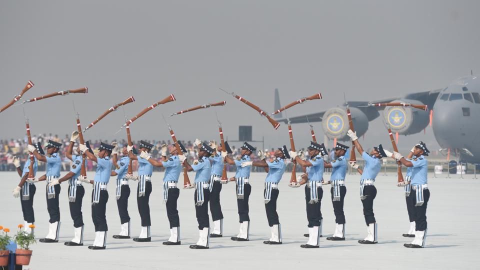 Indian Air Force personnel perform a drill with rifles during the 85th Air Force Day parade at Hindon Air Force base.