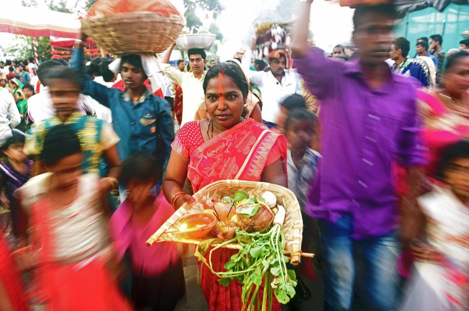 Women carrying some offerings to the Sun God on the occasion of Chhat Puja at Karvenagar in Pune on Thursday. Chhat is a vedic festival historically native to the Madhesh province and Mithila region of Nepal and Bihar, Jharkhand and Uttar Pradesh.