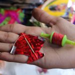 A miniature kite and manjha set at a shop in Jambali Naka, Thane.