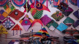 Attractive kites in different colours, shapes and sizes on display at Masjid Bunder. Traditionally, in many parts of the country, including Maharashtra, a sticky laddoo is made on this day, from jaggery and sesame seeds.
