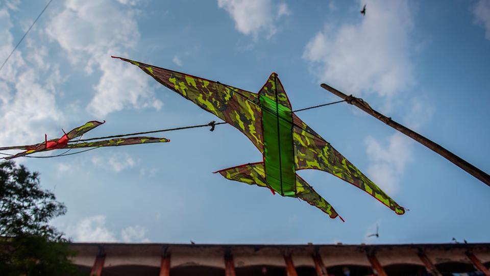 Fighter plane kites wait for take-off in Mumbai.