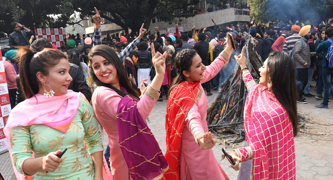 On the eve of Lohri festival, students celebrate at Panjab University, Chandigarh