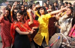 Students of Northern India Institute of Fashion Technology celebrate Lohri at the college campus in Mohali