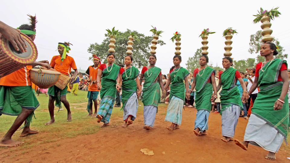 Tribals dance during the ‘Badna Parab’ festival on the eve of Maker Sankranti at Gopalnagar in Birbhum district of West Bengal.