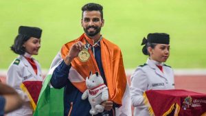 Gold medal winner India Arpinder Singh at the medal ceremony of men's triple jump event