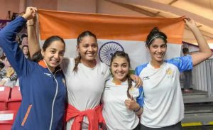 India women squash team Tanvi Khanna, Dipika Pallikal, Karthik Sunayna Kuruvilla and Joshana Chinappa celebrate after winning silver medal